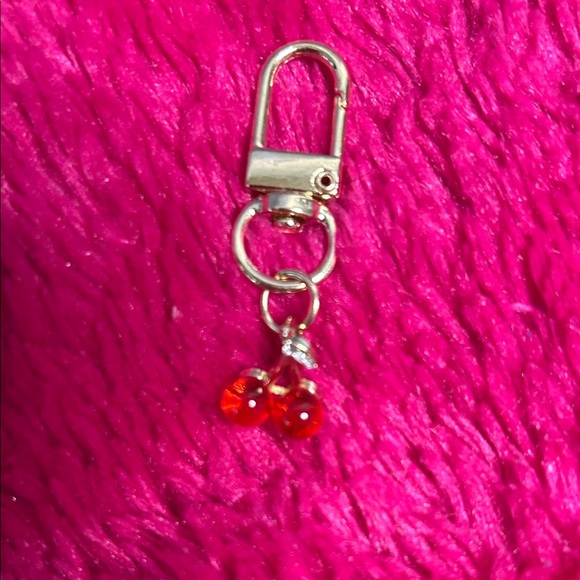 Elegant Silver Keychain with Red Accents - Picture 2 of 3